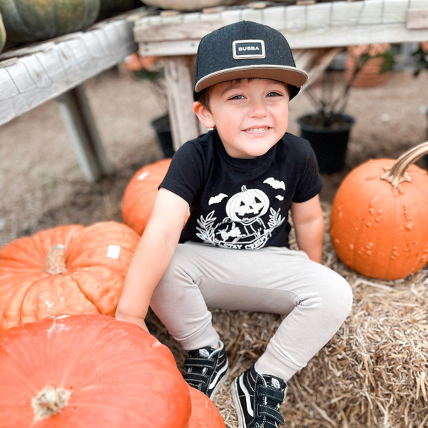 Tahoe Bubba Snapback hat for infants, toddlers, and youth, shown with a medium-profile, structured 5-panel crown and flat bill for a stylish, modern look. Featuring the Knuckleheads patch on a durable, soft blend of 50% wool, 30% rayon, and 20% polyester, with an adjustable snapback closure for a growing fit. Perfect for outdoor adventures and everyday wear