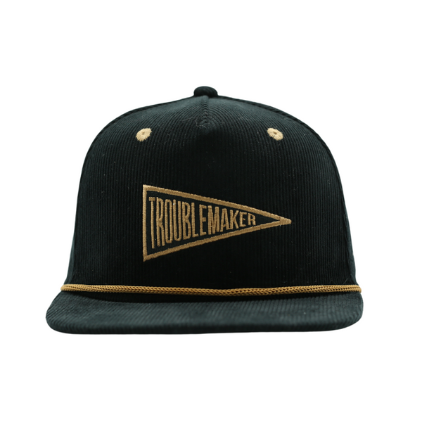 black infant hat with troublemaker patch