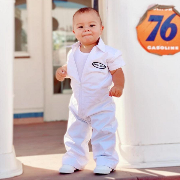White jumpsuit boys top