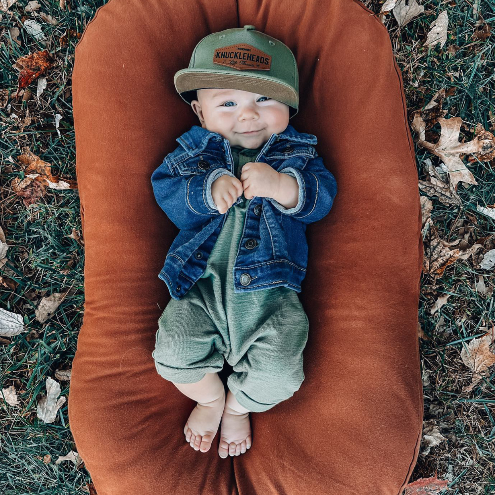 Image of Green Kids Trucker Hat with Knuckleheads Patch: A vibrant and stylish accessory designed for kids. In a lively green hue, it showcases a striking Knuckleheads patch on the front. Elevate your child's style with this fashionable hat, perfect for adding a pop of color to their outfits. Crafted with care, this green kids trucker hat with the Knuckleheads patch is a must-have addition to their wardrobe, suitable for various occasions and everyday wear.