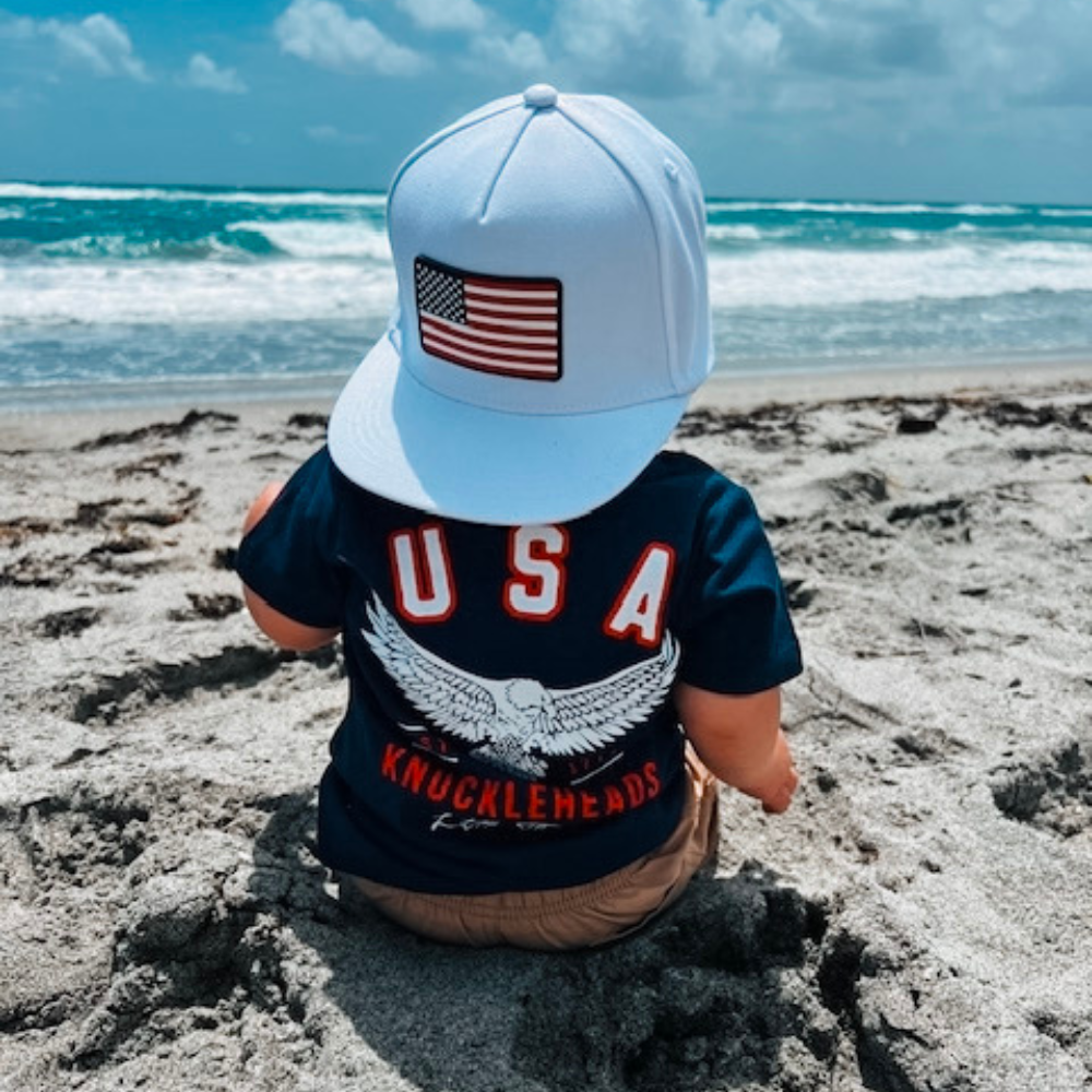 Image of US Patriotic Kids T-Shirt: A vibrant and stylish tee celebrating USA, featuring patriotic designs and soft cotton fabric for comfort. Perfect for young patriots to wear with pride and confidence.